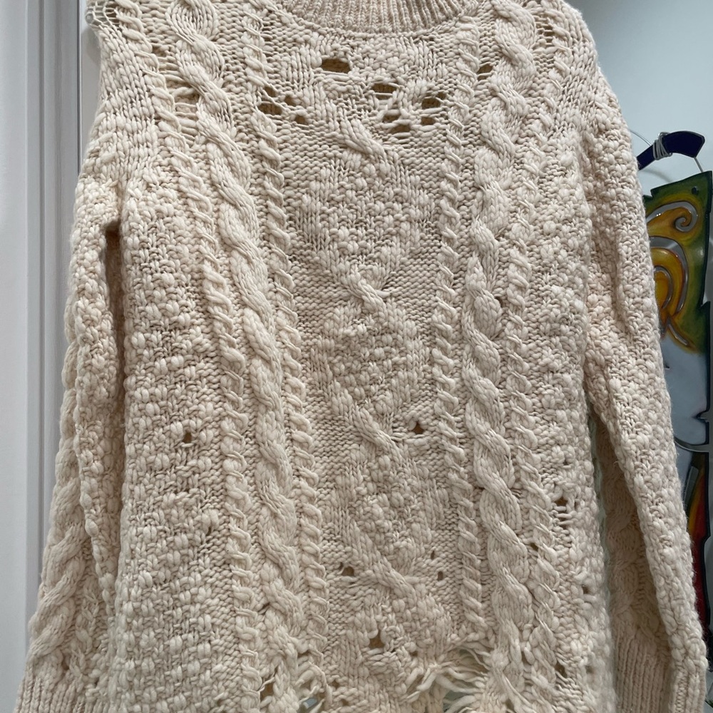 Cream knit sweater. Never worn.  Adorable